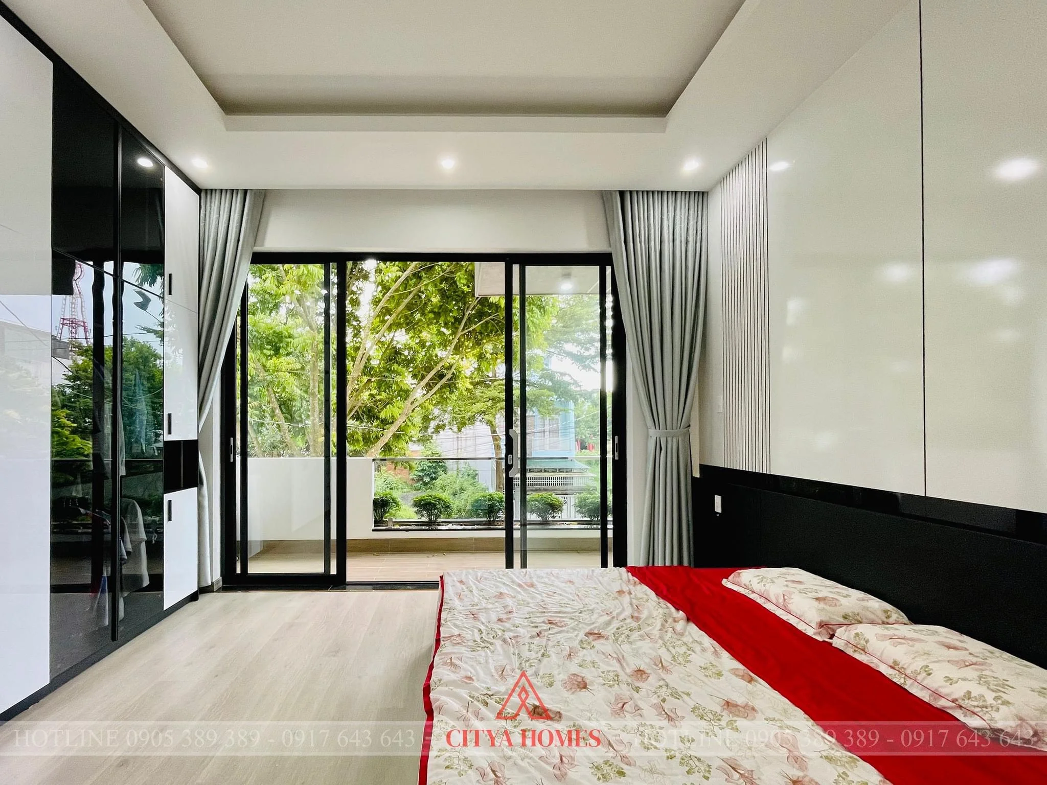 phong_ngu_nha_pho_3_tang_thiet_ke_mo_cua_kinh_ban_cong_sang_tu_nhien_citya_homes

